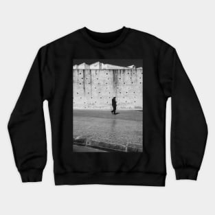 Man Walking Past Ancient City Wall Crewneck Sweatshirt